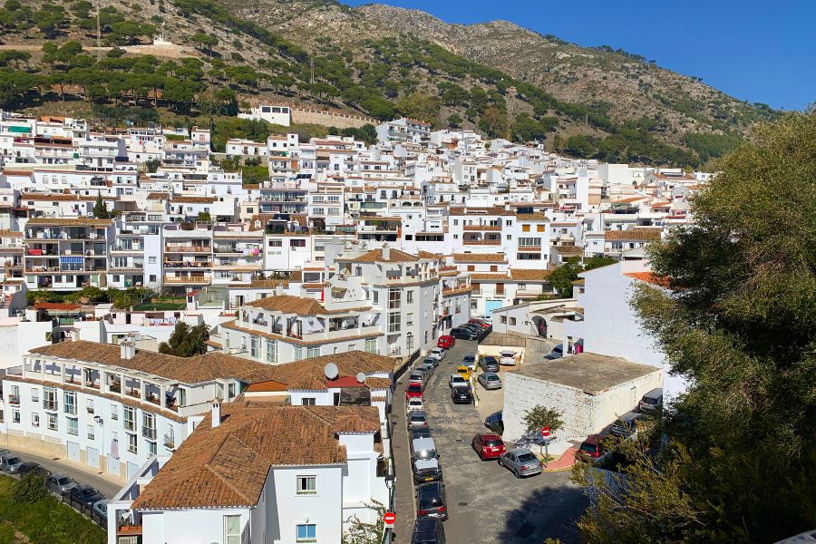 Two friends laughing during a car hire Mijas Costa road trip